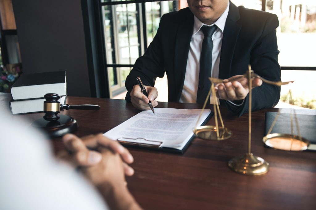 Business lawyer is currently counseling the client's trial at the lawyer office.